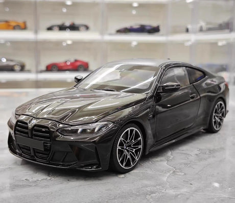 [Minichamps] 1:18 BMW 2021 M4 G82 zwart modelauto Die-Cast