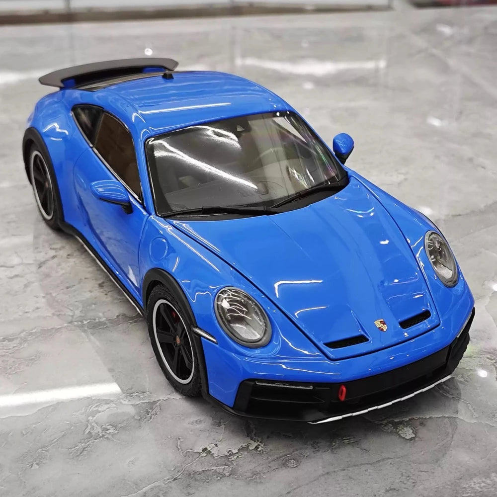 [Minichamps] 1:18 Porsche 2023 911 Dakar blauw modelauto Die-Cast