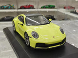 [Minichamps] 1:18 Porsche 2024 911 992.2 Carrera grön modellbil harts