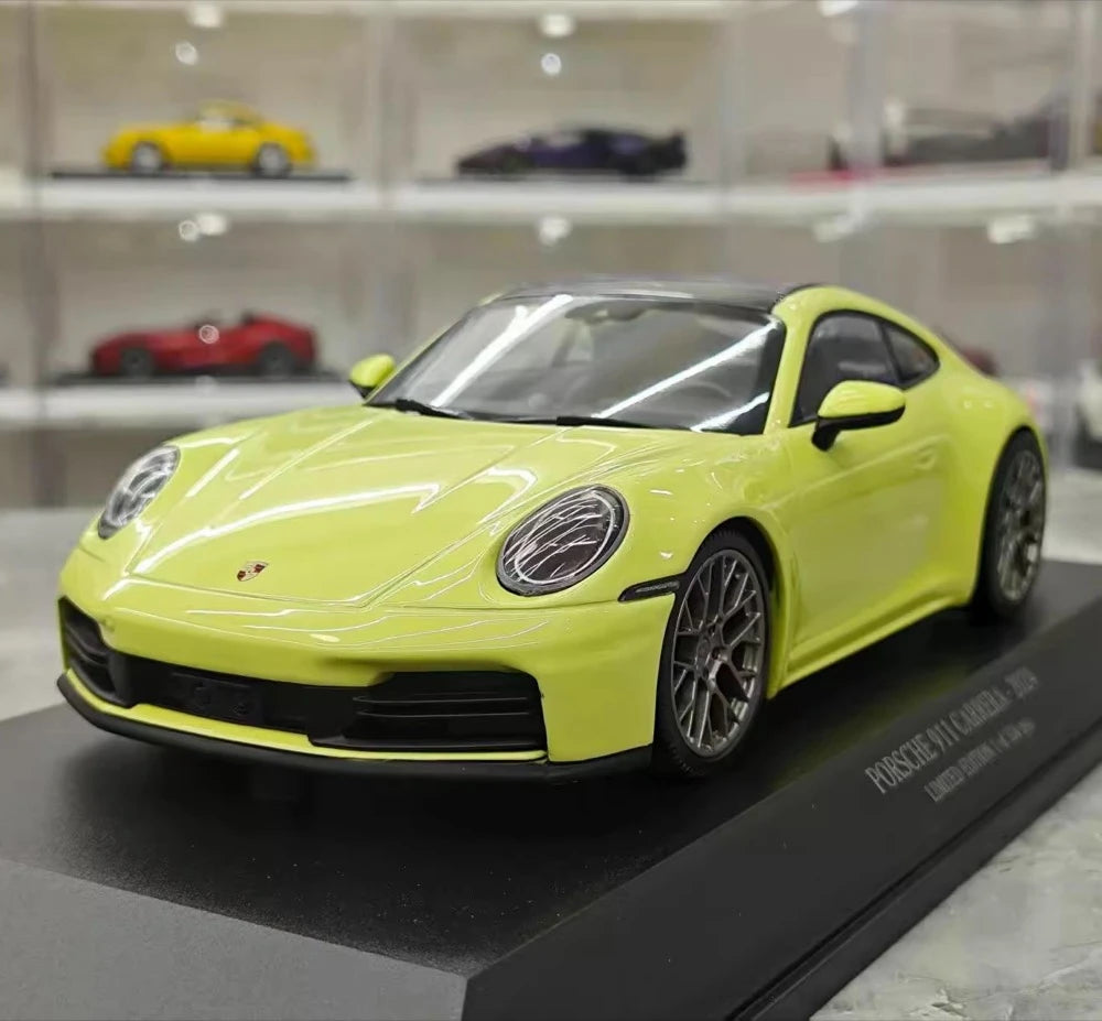 [Minichamps] 1:18 Porsche 2024 911 992.2 Carrera grön modellbil harts