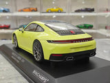 [Minichamps] 1:18 Porsche 2024 911 992.2 Carrera grön modellbil harts