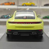 [Minichamps] 1:18 Porsche 2024 911 992.2 Carrera grön modellbil harts
