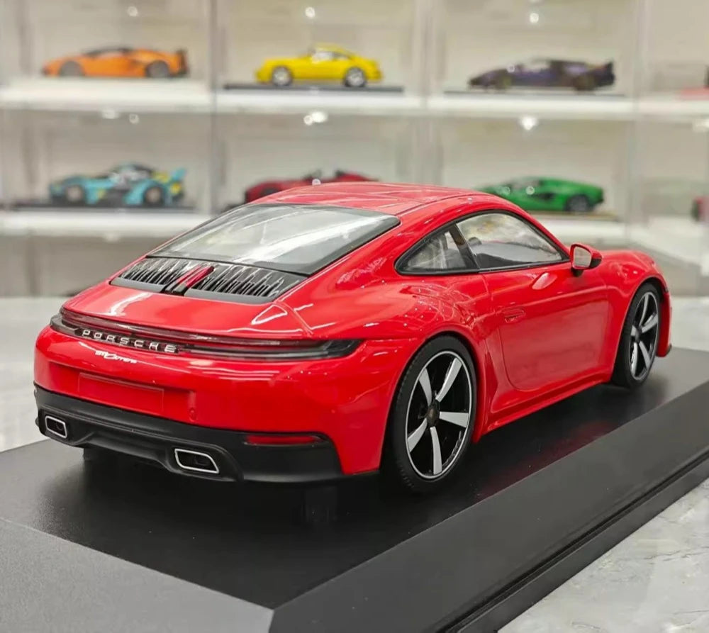 [Minichamps] 1:18 Porsche 2024 911 992.2 Carrera rosso modellino di auto resina