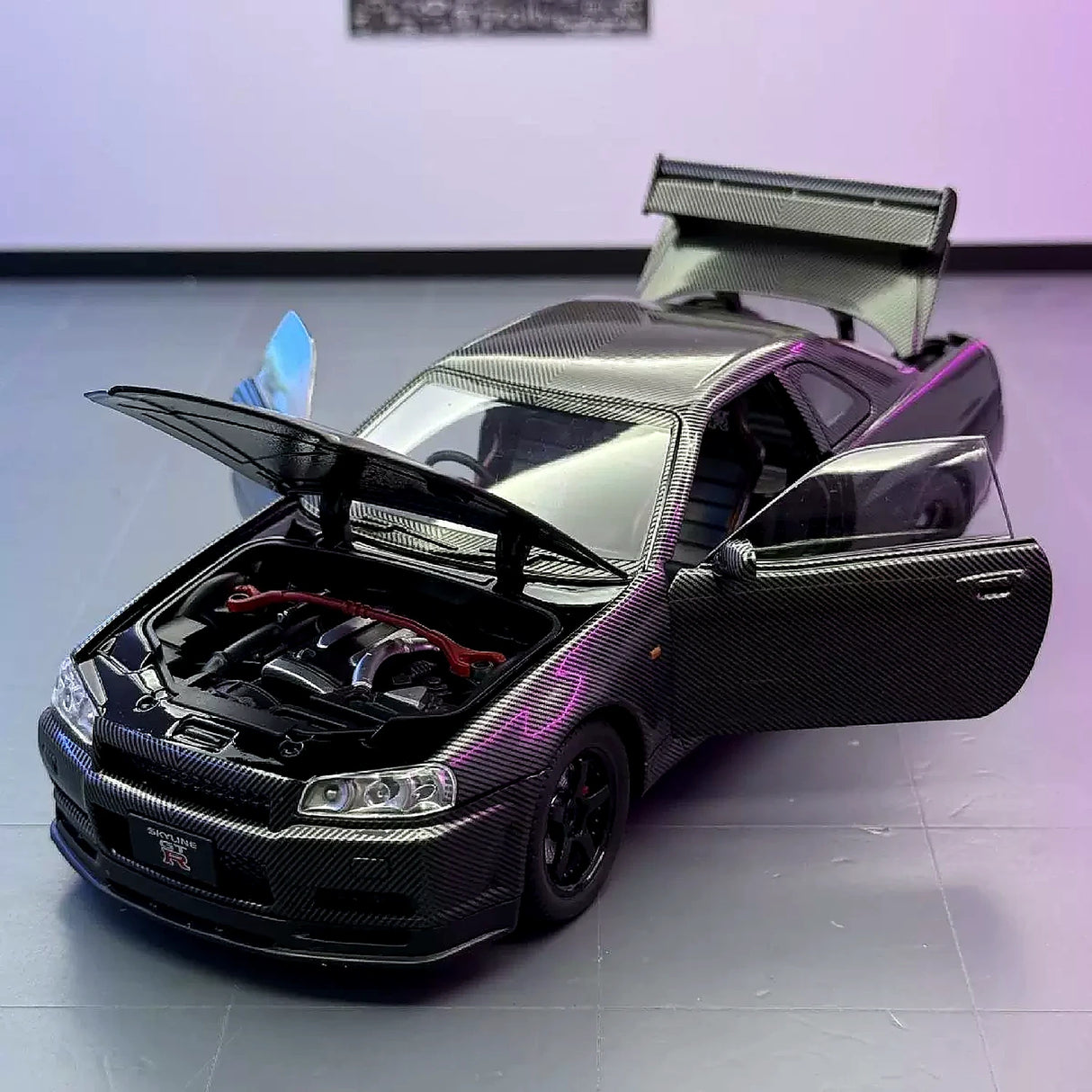 Nissan 1999 Skyline GT-R R34 zwart 1:24 – diecast displaymodel