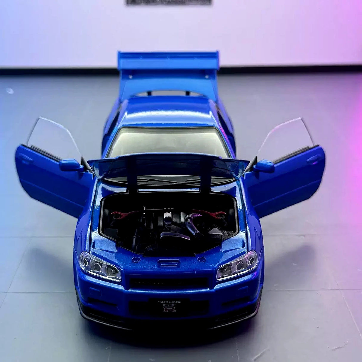 Nissan 1999 Skyline GT-R R34 blauw 1:24 – diecast displaymodel