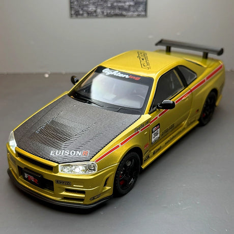 Nissan 1999 Skyline GT-R R34 goud 1:24 – diecast displaymodel