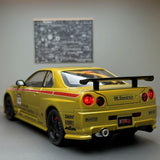 Nissan 1999 Skyline GT-R R34 goud 1:24 – diecast displaymodel