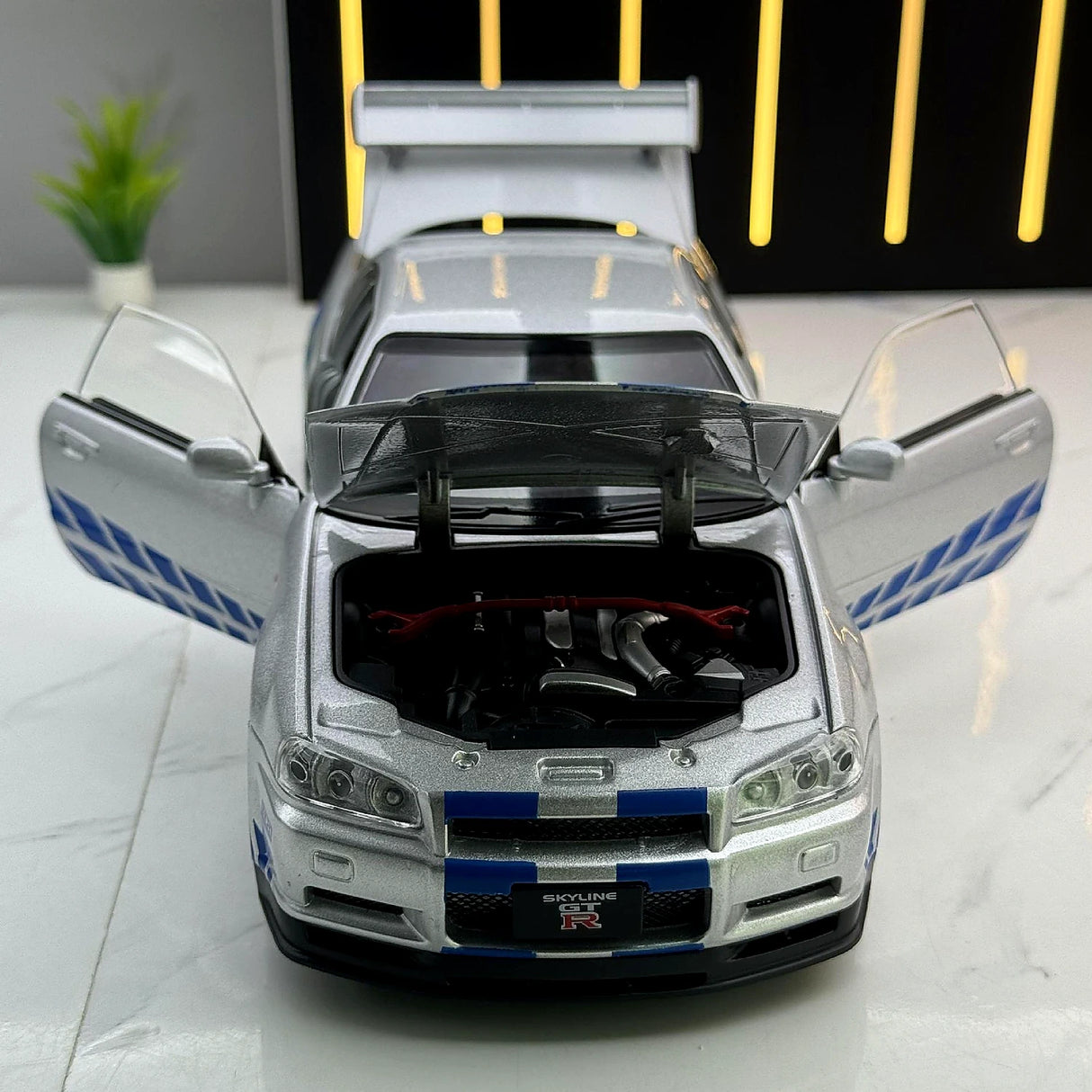 Nissan 1999 Skyline GT-R R34 zilver 1:24 – diecast displaymodel