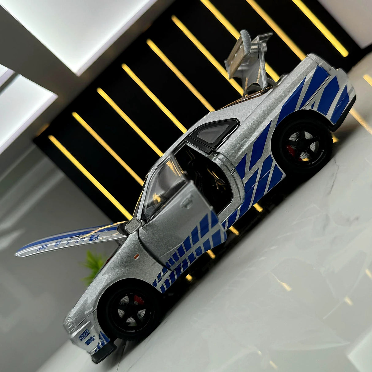 Nissan 1999 Skyline GT-R R34 zilver 1:24 – diecast displaymodel
