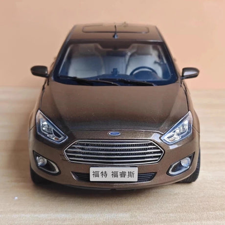 [OEM] 1:18 Ford 2014 Escort bruin modelauto Die-Cast