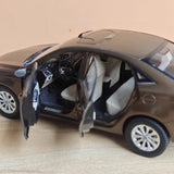 [OEM] 1:18 Ford 2014 Escort bruin modelauto Die-Cast