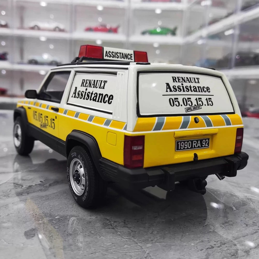 [OTTO] 1:18 Jeep 1990 Cherokee Renault Assistance modellbil harts