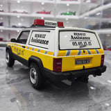 [OTTO] 1:18 Jeep 1990 Cherokee Renault Assistance modellbil harts