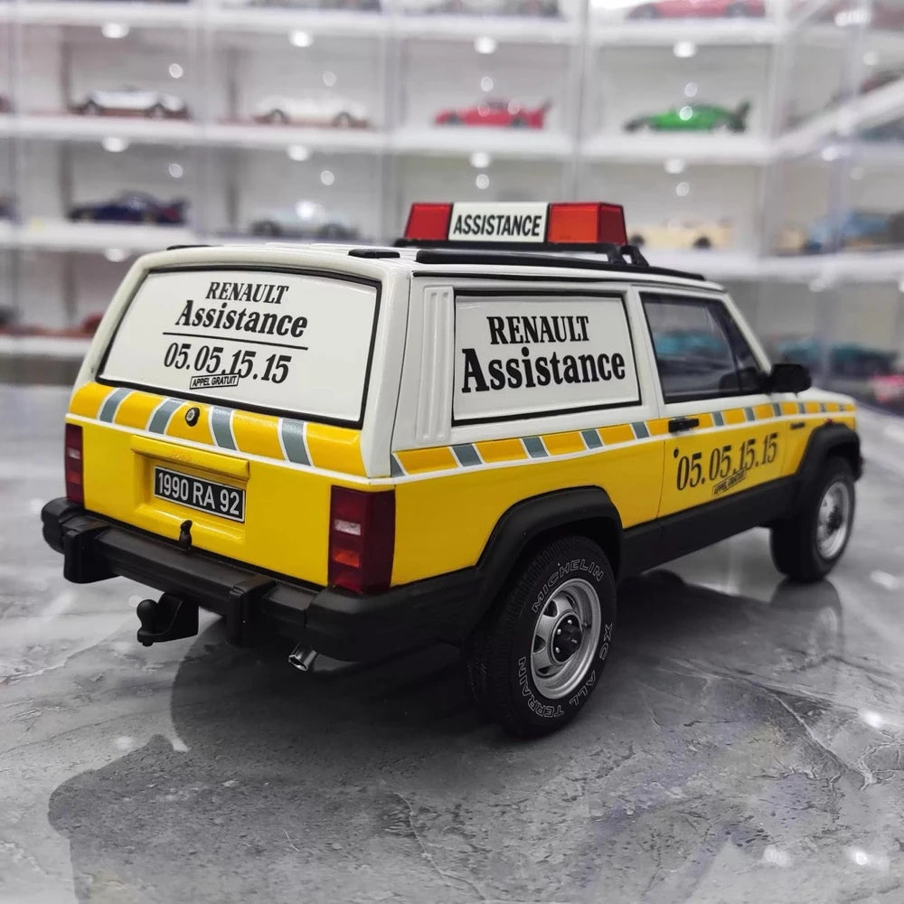 [OTTO] 1:18 Jeep 1990 Cherokee Renault Assistance modellbil harts