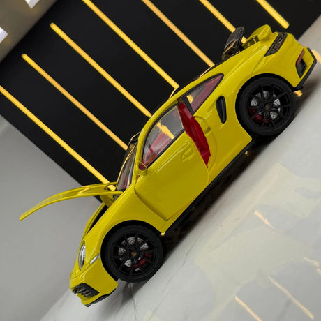 Porsche 2021 911 Turbo S geel 1:24 – diecast displaymodel